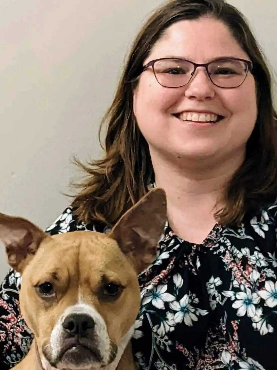 Image of Dr. Walker and her dog.